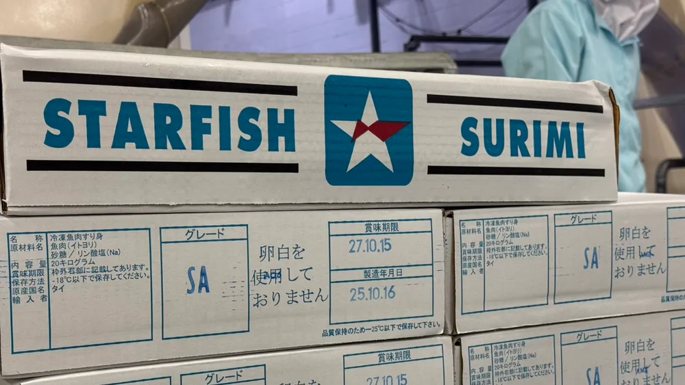 Cartons of Starfish surimi labelled by grade, ready for export.